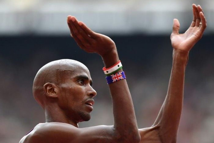 Britain's Mo Farah celebrates after winning the 3000m at the IAAF Diamond League Anniversary Games in London on July 9, 2017