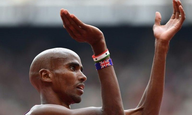 Britain's Mo Farah celebrates after winning the 3000m at the IAAF Diamond League Anniversary Games in London on July 9, 2017