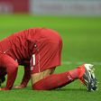 Liverpool's Egyptian midfielder Mohamed Salah celebrates after scoring the opening goal of the English Premier League football match between Watford and Liverpool at Vicarage Road Stadium in Watford, north of London on November 24, 2018.