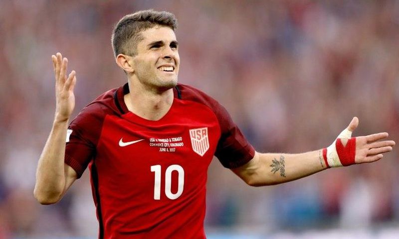 Christian Pulisic of the US National Team celebrates scoring a goal against Trinidad & Tabago in the second half during the FIFA 2018 World Cup Qualifier at Dick's Sporting Goods Park on June 8, 2017 in Commerce City, Colorado