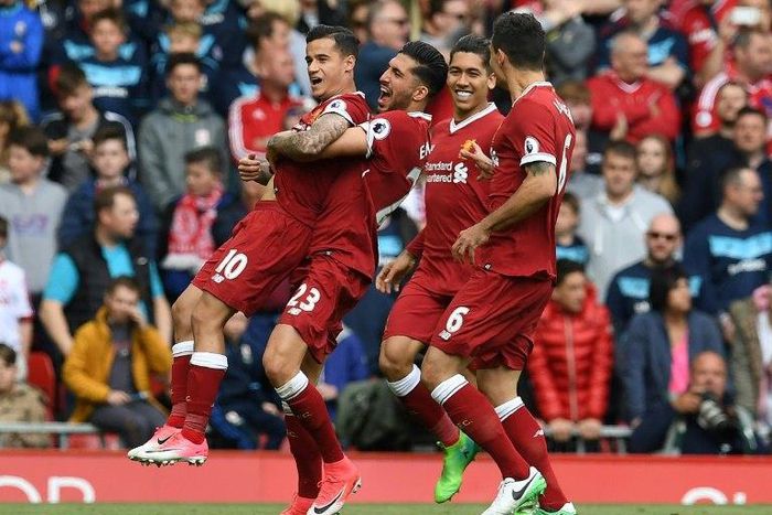 Liverpool's Philippe Coutinho (L) celebrates with teammates after scoring a goal during an English Premier League match, at Anfield in Liverpool, in May 2017