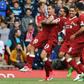 Liverpool's Philippe Coutinho (L) celebrates with teammates after scoring a goal during an English Premier League match, at Anfield in Liverpool, in May 2017