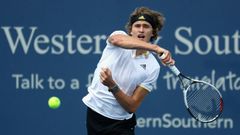 Alexander Zverev of Germany returns a shot to Frances Tiafoe during Day 5 of the Western & Southern Open at the Linder Family Tennis Center on August 16, 2017 in Mason, Ohio