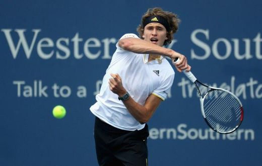 Alexander Zverev of Germany returns a shot to Frances Tiafoe during Day 5 of the Western & Southern Open at the Linder Family Tennis Center on August 16, 2017 in Mason, Ohio