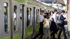The scene at a Tokyo train station as Japan launches an exercise to encourage commuters to work from home in the run-up to the summer Olympics in 2020