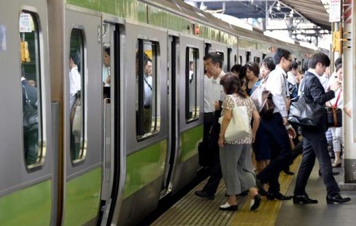 The scene at a Tokyo train station as Japan launches an exercise to encourage commuters to work from home in the run-up to the summer Olympics in 2020