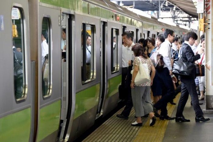 The scene at a Tokyo train station as Japan launches an exercise to encourage commuters to work from home in the run-up to the summer Olympics in 2020