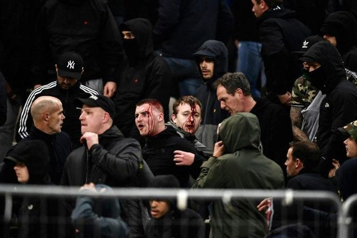 Ajax fans were injured after Greek riot police separated fighting fans