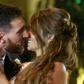 Argentine football star Lionel Messi and bride Antonella Roccuzzo pose for photographers just after their wedding in Rosario, Argentina on June 30, 2017