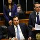 Jair Bolsonaro (R), standing next to Brazil's lower house president Rodrigo Maia, addresses Congress before being sworn in as Brazil's new president on January 1, 2019