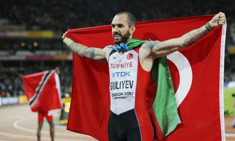 Turkey's Ramil Guliyev celebrates after winning the final of the men's 200m athletics event at the 2017 IAAF World Championships at the London Stadium in London on August 10, 2017