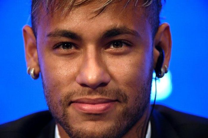Brazil's Neymar speaks to the press at Paris Saint-Germain's Parc des Princes stadium on August 4, 2017