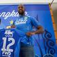 Former West Ham and Chelsea striker Carlton Cole (R) and Persib manager Umuh Muhtar hold up Cole's jersey during a press conference in Bandung, Indonesia on March 30, 2017