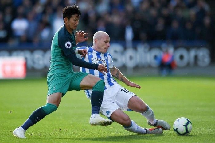 Australia midfielder Aaron Mooy sealed Huddersfield's win at Wolves