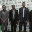 Head of Business, Glo Mobile Ghana, Mr Rowland Odolokor (4th left), flanked by Mr Abhishek Vora, Marketing (1st left) and Glo dealers, Mr Kojo Amoakum, MD, K&F Enterprises, Mr Edward Banson, MD This-&-That Enterprise, at the launch of Glo  “AyƐ DƐ kƐkƐ...