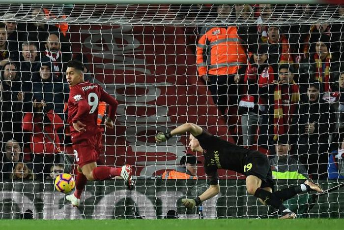 Hat-trick hero: Roberto Firmino scores the first of his three goals in Liverpool's 5-1 win over Arsenal