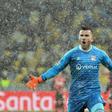 Lyon goalkeeper Anthony Lopes celebrates his side qualifying for the Champions League last 16 with a 1-1 draw against Shakhtar Donetsk in Kiev