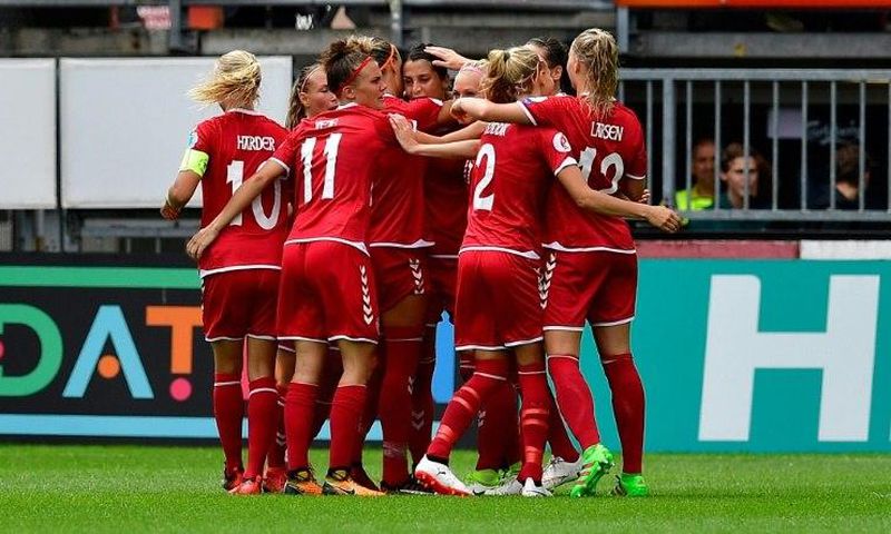 Denmark's forward Nadia Nadim (C) celebrates with teammates after scoring on July 30, 2017