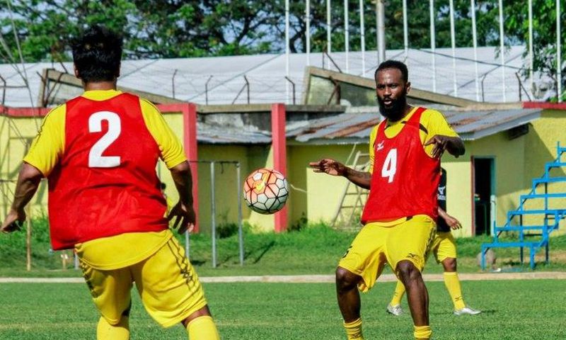 Former Tottenham Hotspur midfielder Didier Zokora (R), seen during a practice session in Padang, West Sumatra, in April 2017