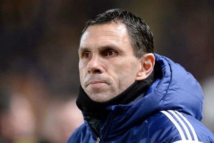 Uruguayan Gus Poyet's future as Shanghai Shenhua coach is hanging in the balance after the team lost 3-0 at home against mid-table Guizhou Zhicheng
