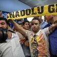 French football player Mathieu Valbuena (C) is greeted by fans as he arrives at Ataturk International airport in Istanbul, Turkey in June