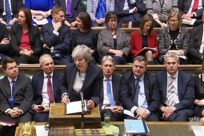 May said she would delay Tuesday's vote, admitting her Brexit deal would be rejected in it