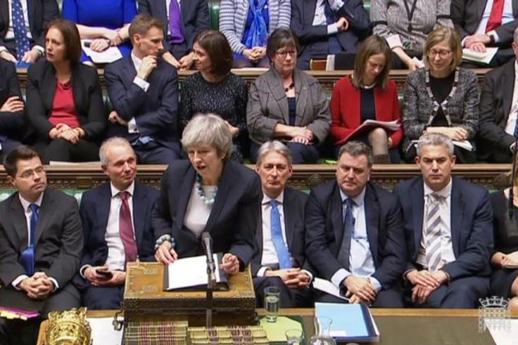 May said she would delay Tuesday's vote, admitting her Brexit deal would be rejected in it