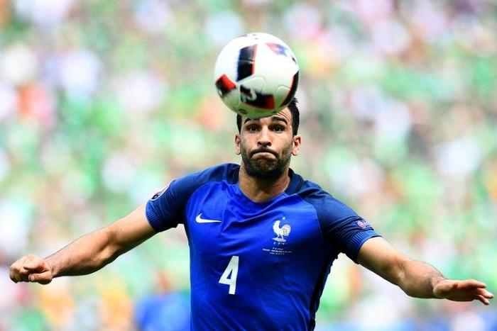 France's defender Adil Rami plays the ball during the Euro 2016 round of 16 football match against Republic of Ireland at the Parc Olympique Lyonnais stadium June 26, 2016