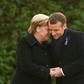 Germany is taking a softly-softly approach to French President Emmanuel Macron's easing of the budget strings to cope with protests, with Chancellor Angela Merkel (right) focussing on stability in Europe, analysts say