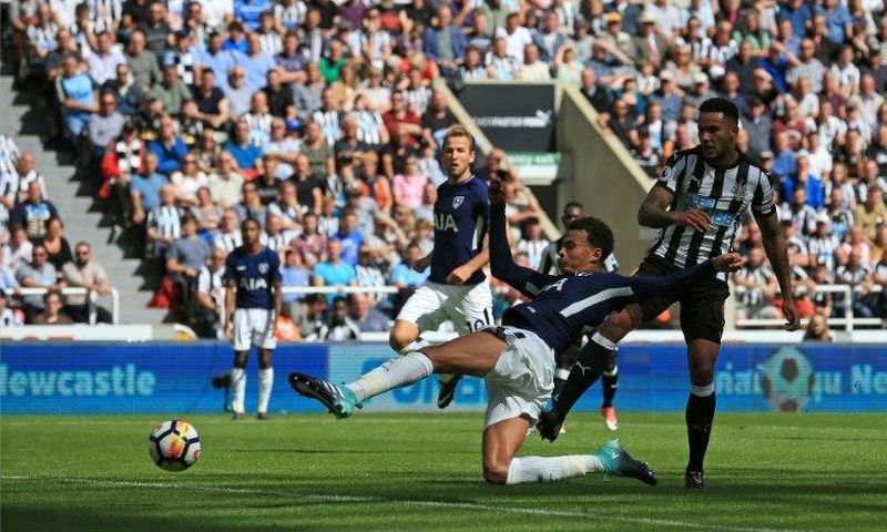 Tottenham Hotspur's Dele Alli scores a goal during their English Premier League match against Newcastle United, at St James' Park in Newcastle-upon-Tyne, on August 13, 2017