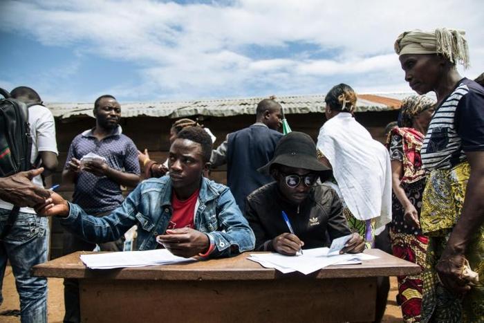 Determined to have a taste of much-delayed democracy in the troubled country, many turned out at make-shift polling stations for a staged vote