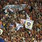 Fans of Paraguay's Cerro Porteno cheer for their team during their Copa Libertadores 2016 football match against Colombia's Independiente de Santa Fe at Defensores del Chaco stadium in Asuncion, on April, 20, 2016