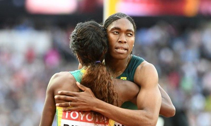 South Africa's Caster Semenya (R) embraces Ethiopia's Genzebe Dibaba at the 2017 IAAF World Championships at the London Stadium in London on August 4, 2017
