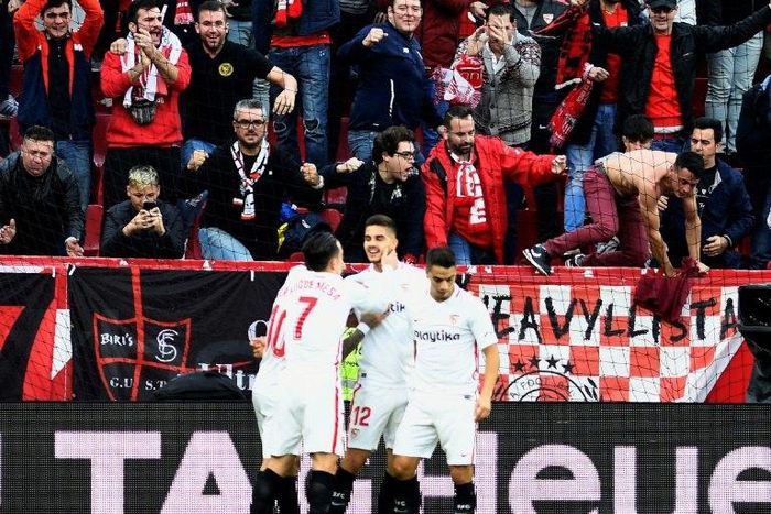 Sevilla celebrate after Andre Silva's goal lifts them to the top of the La Liga table