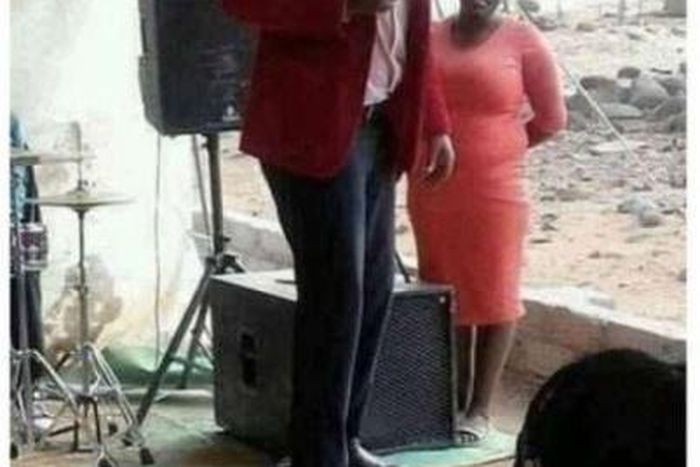 Pastor stands on woman’s buttocks for a miracle