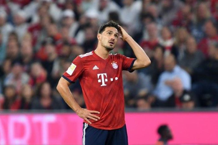 Bayern Munich will be without Mats Hummels, who has a stomach bug, for Tuesday's Champions League home match against Benfica with the Germans needing just a point to reach the last 16 in Europe.
