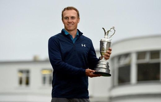 US golfer Jordan Spieth poses for pictures with the Claret Jug