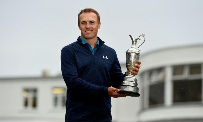 US golfer Jordan Spieth poses for pictures with the Claret Jug