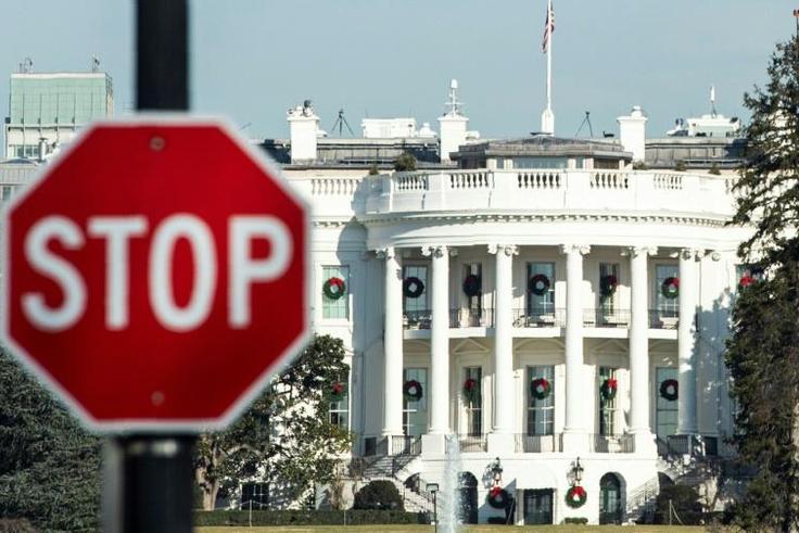 A stop sign is seen near the White House during the partial shutdown of government services