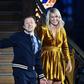 Norwegian forward Ada Hegerberg (R) stands alongside French DJ and producer Martin Solveig (L) after receiving the 2018 women's Ballon d'Or award.