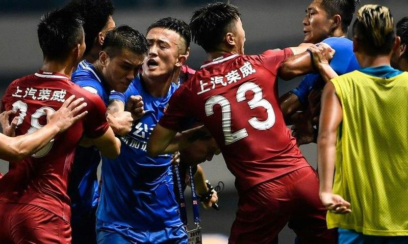 The brawl erupted after Shanghai SIPG playmaker Oscar appeared to fire the ball deliberately at Guangzhou players