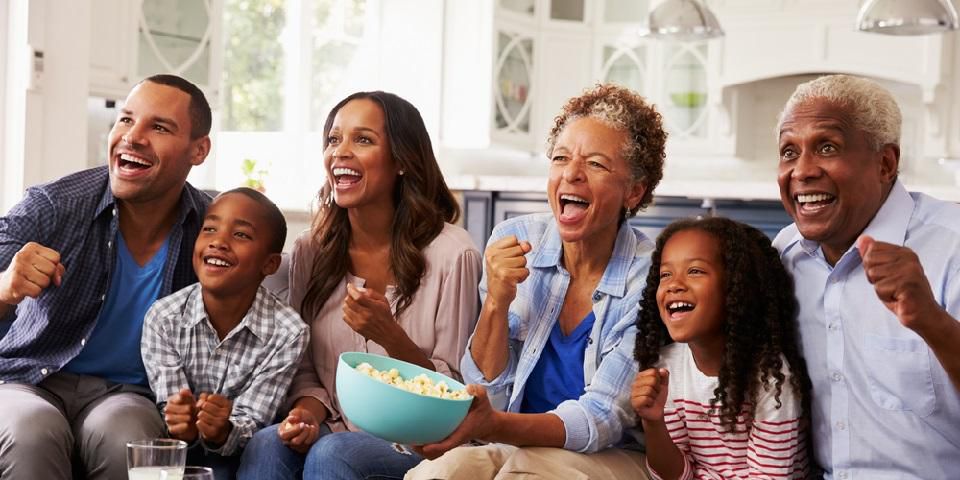 Family-watching-a-movie-together