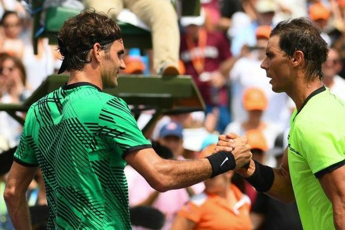 Roger Federer (L), pictured in April 2017, has withdrawn from the 2017 Cincinnati Masters tournament, citing a back injury, ensuring Rafael Nadal (R) a return to the top spot in tennis world rankings