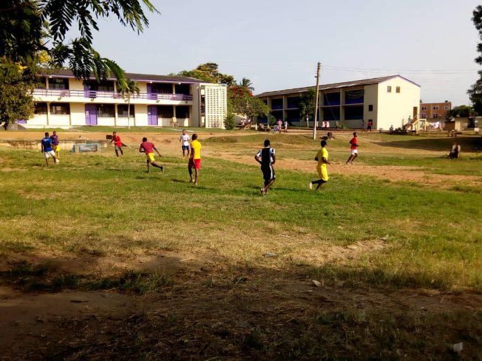Some students playing football