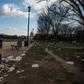 Litter spills out of a public dustbin on the National Mall in Washington as the US government shutdown goes into its third day
