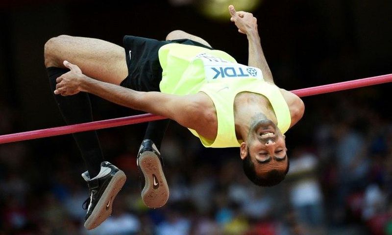 Syrian high jumper Majd Eddin Ghazal competes at the 2015 IAAF World Championships in Beijing
