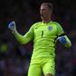 England goalkeeper Joe Hart celebrates his side's late equaliser against Scotland in Glasgow on June 10, 2017