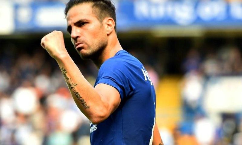 Chelsea's Spanish midfielder Cesc Fabregas celebrates scoring his team's first goal during the English Premier League match against Everton at Stamford Bridge in London on August 27, 2017