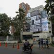 The Monaco building, once home to Colombian drug lord Pablo Escobar, is seen covered with pictures of victims of his Medellin Cartel, in Medellin, Colombia, on December 11, 2018