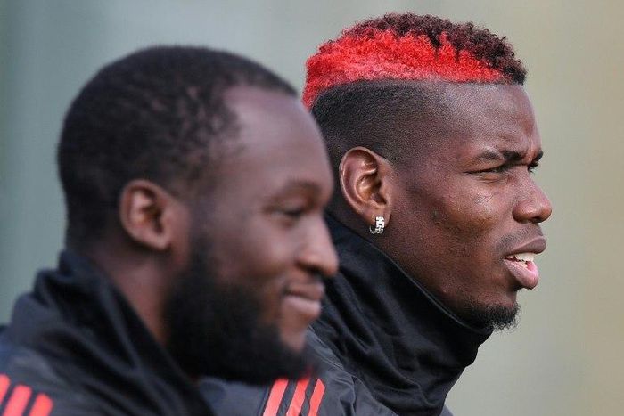 Romelu Lukaku (left) and Paul Pogba (right) were both dropped to the bench for Manchester United's clash with Arsenal on Wednesday